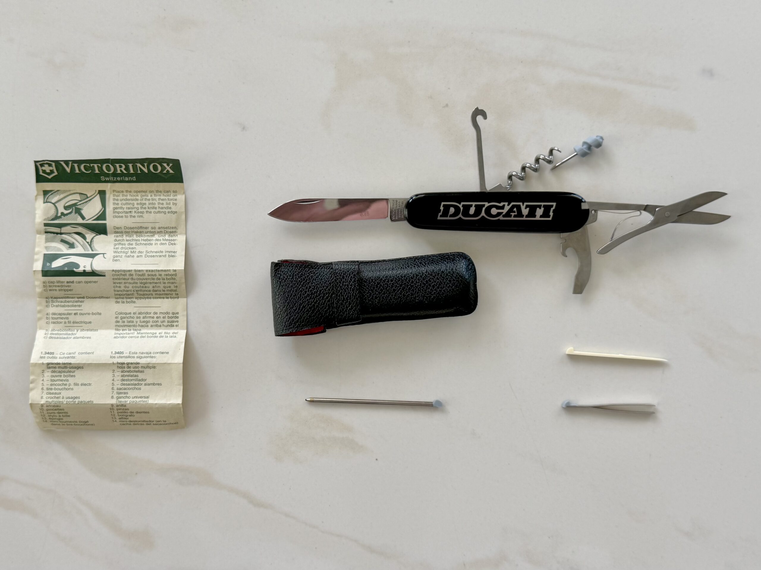 Original Ducati Victorinox Compact 13405 Swiss Army Knife mit Lederetui Garantieunterlagen Originalzubehör Schweizer Taschenmesser Sammlerstück Original Ducati Victorinox Compact 13405 Swiss Army Knife mit Lederetui Garantieunterlagen Originalzubehör Schweizer Taschenmesser Sammlerstück